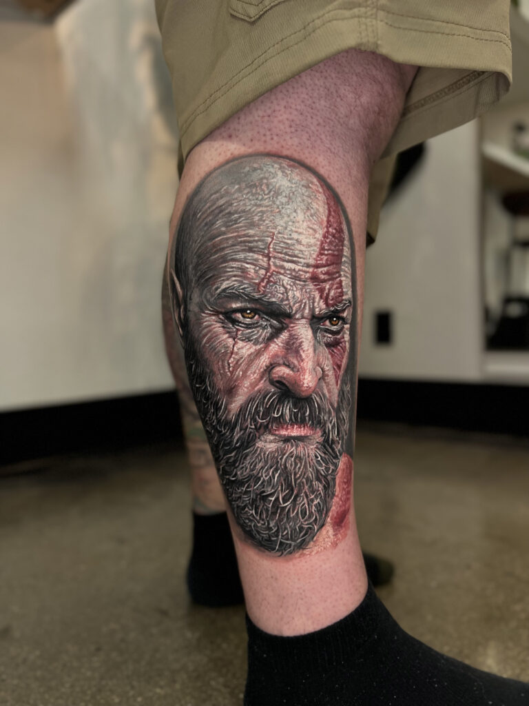 Mike DeVries_God of war tattoo_realistic kratos_tattoo_socal